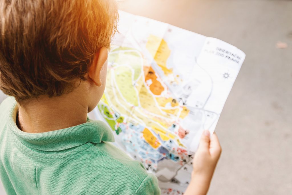 Child Holding Map